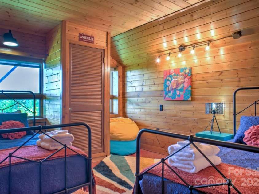 140 Camby Drive, Fairview, NC 28730.  MLS# CAR4178451, YatesRealty ID 2344. Downstairs bedroom 4