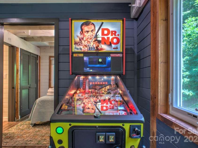 140 Camby Drive, Fairview, NC 28730.  MLS# CAR4178451, YatesRealty ID 2344. Game room on main level