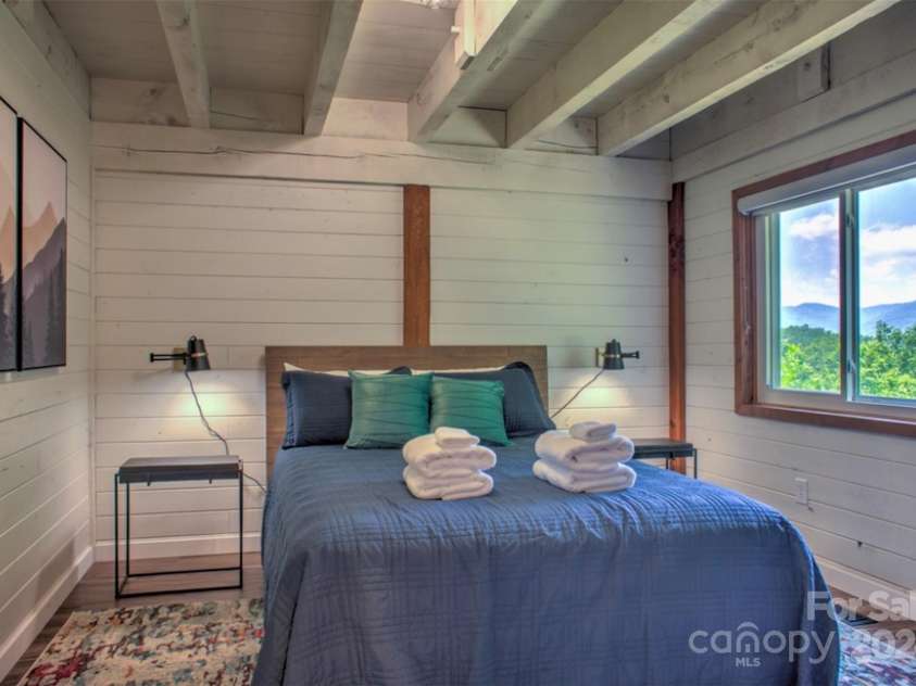 140 Camby Drive, Fairview, NC 28730.  MLS# CAR4178451, YatesRealty ID 2344. Main level bedroom 1