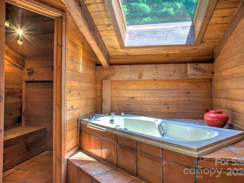 140 Camby Drive, Fairview, NC 28730.  MLS# CAR4178451, YatesRealty ID 2344. Soaker tub - upstairs bath