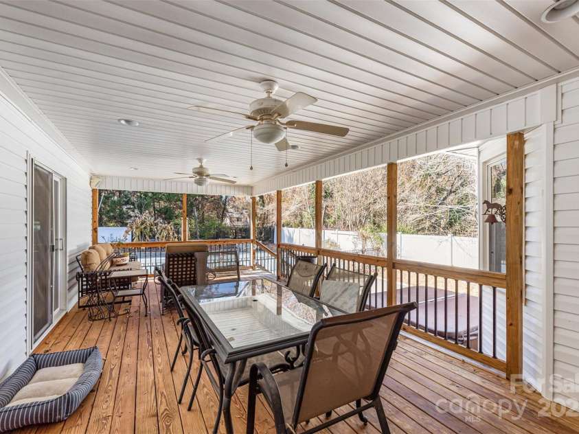 300 Gloucestershire Road, Winston Salem, NC 27104.  MLS# CAR4321606, YatesRealty ID 2344. Covered Porch off Kitchen and Primary Bedroom leading to pool