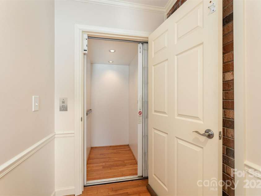 300 Gloucestershire Road, Winston Salem, NC 27104.  MLS# CAR4321606, YatesRealty ID 2344. Elevator to second living quarters and basement