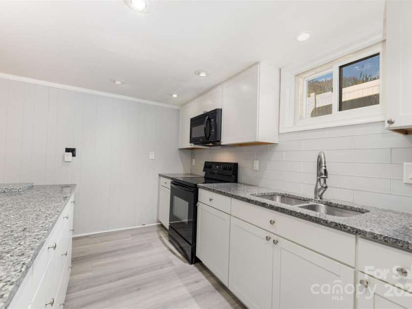 300 Gloucestershire Road, Winston Salem, NC 27104.  MLS# CAR4321606, YatesRealty ID 2344. Second Living Quarters Kitchen