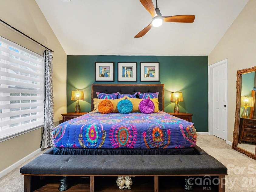 8331 Christmas Court, Charlotte, NC 28216.  MLS# CAR4340042, YatesRealty ID 2344. Primary Bedroom with new carpet, vaulted ceiling, walk-in closed and more