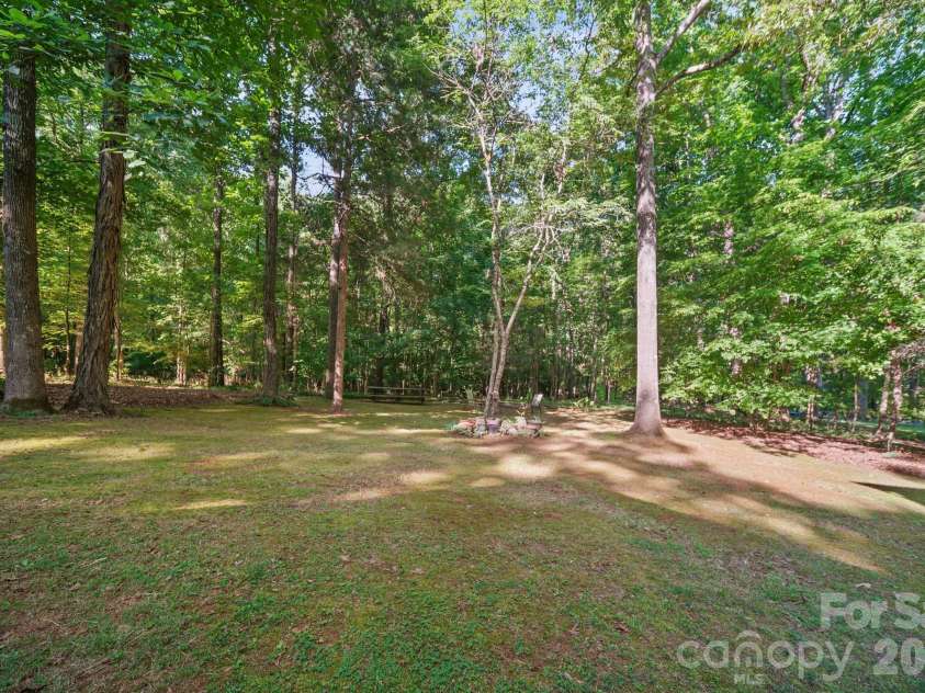 11421 Winners Circle, Charlotte, NC 28215.  MLS# CAR4344294, YatesRealty ID 23444. Backyard