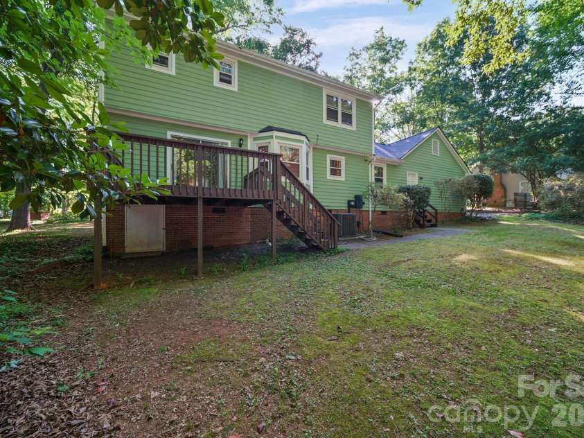 11421 Winners Circle, Charlotte, NC 28215.  MLS# CAR4344294, YatesRealty ID 23444. Backyard looking towards the house