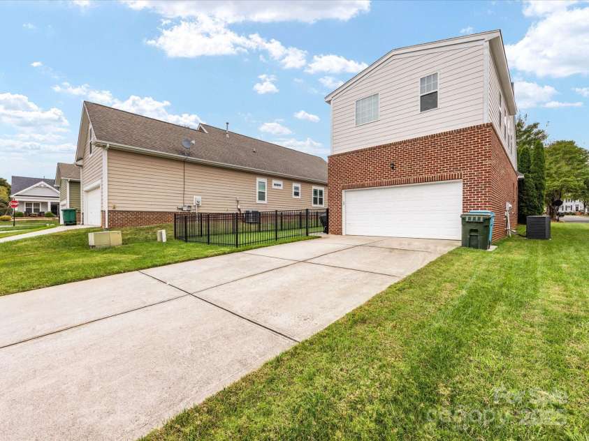 4303 Patriots Hill Road, Mint Hill, NC 28227.  MLS# CAR4309426, YatesRealty ID 23445. Rear Entry Garage