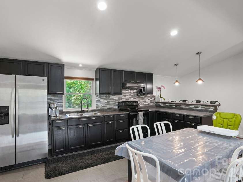 421 Emma Road, Asheville, NC 28806.  MLS# CAR4375905, YatesRealty ID 23449. 
