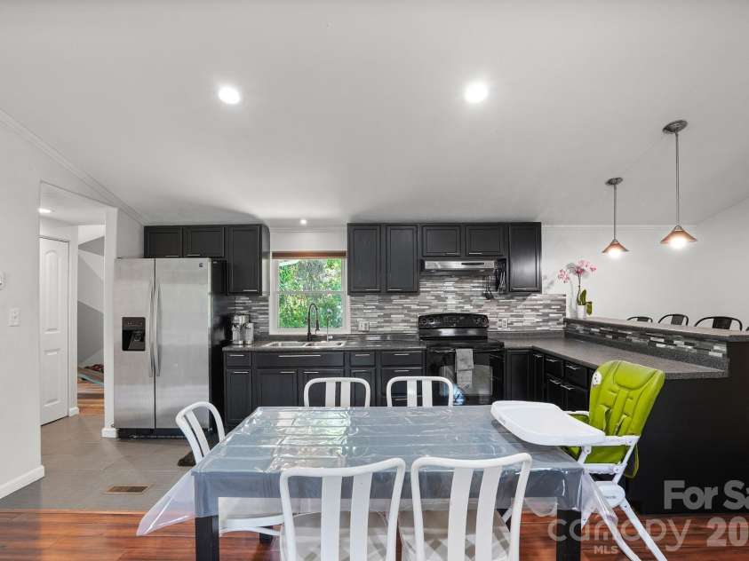 421 Emma Road, Asheville, NC 28806.  MLS# CAR4375905, YatesRealty ID 23449. 