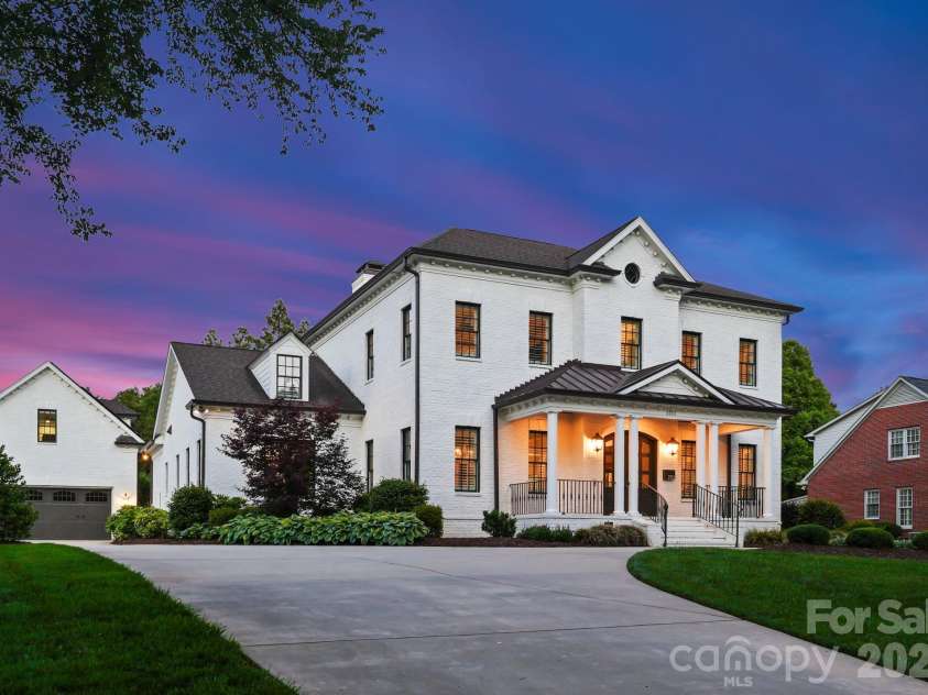 2313 Richardson Drive, Charlotte, NC 28211.  MLS# CAR4382670, YatesRealty ID 23450. Beautiful twilight Exterior