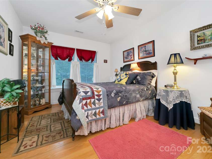 229 Hubbard Hollow Road, Rosman, NC 28772.  MLS# CAR4264936, YatesRealty ID 23454. Also on the garage side of the house are three more bedrooms and another full bath. This is the second bedroom. Three bedroom septic system, but actually 4 bedrooms in the house.