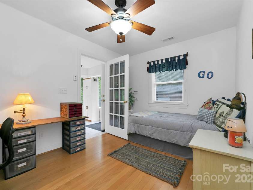 229 Hubbard Hollow Road, Rosman, NC 28772.  MLS# CAR4264936, YatesRealty ID 23454. Also on the garage side of the house are three more bedrooms and another full bath. Three bedroom septic system, but actually 4 bedrooms in the house. This fourth bedroom is being used as an office with a bed.