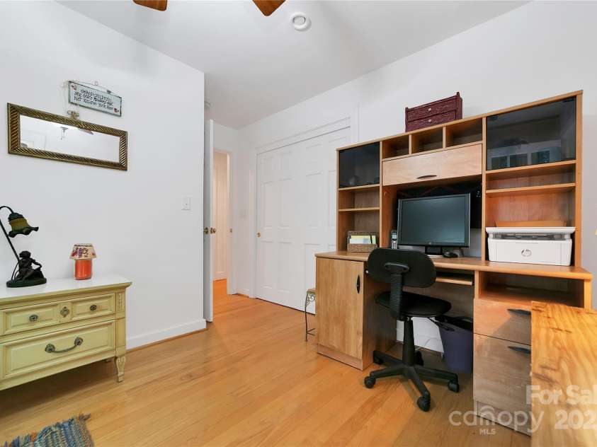 229 Hubbard Hollow Road, Rosman, NC 28772.  MLS# CAR4264936, YatesRealty ID 23454. Also on the garage side of the house are three more bedrooms and another full bath. Three bedroom septic system, but actually 4 bedrooms in the house. This fourth bedroom is being used as an office with a bed.