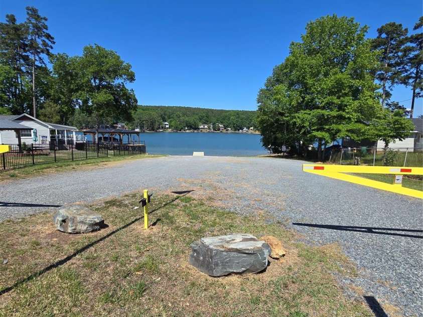 159 Hillcrest Road, New London, NC 28271.  MLS# CAR4371707, YatesRealty ID 23455. Optional gated boat ramp