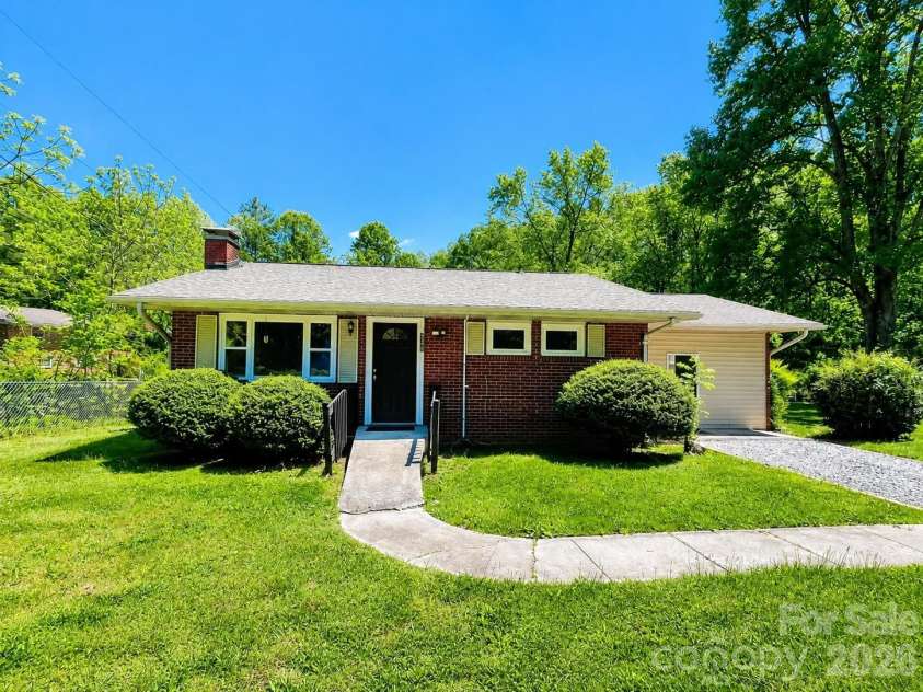 535 Nicholson Creek Road, Brevard, NC 28712.  MLS# CAR4362602, YatesRealty ID 23457. 
