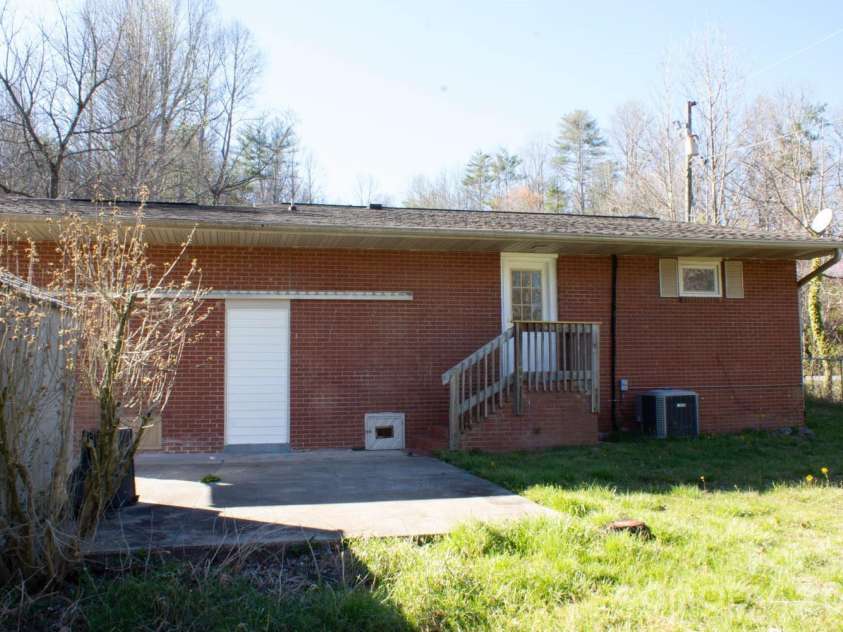 535 Nicholson Creek Road, Brevard, NC 28712.  MLS# CAR4362602, YatesRealty ID 23457. Rear Elevation