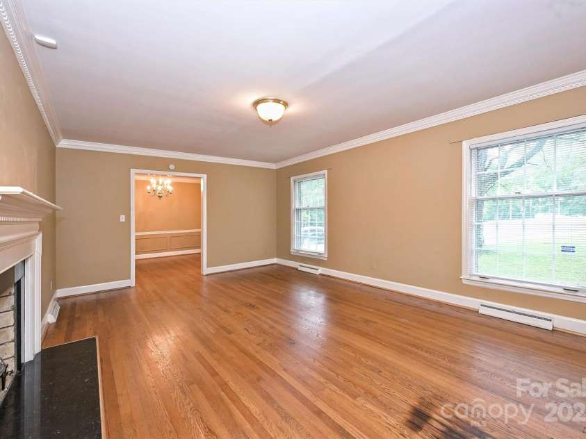 1961 Runnymede Lane, Charlotte, NC 28211.  MLS# CAR4265573, YatesRealty ID 23458. Living Room
