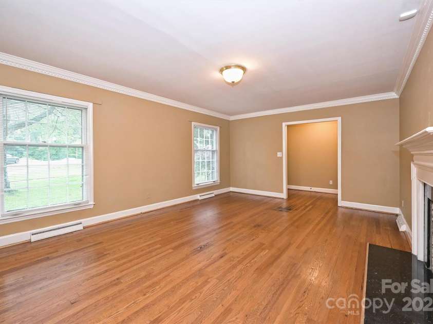 1961 Runnymede Lane, Charlotte, NC 28211.  MLS# CAR4265573, YatesRealty ID 23458. Living Room