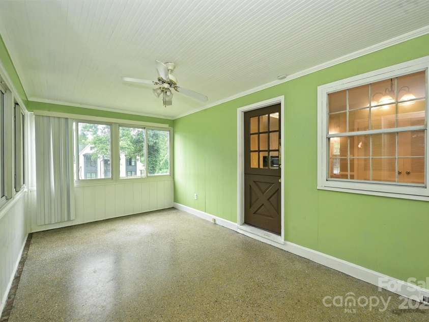 1961 Runnymede Lane, Charlotte, NC 28211.  MLS# CAR4265573, YatesRealty ID 23458. Sunroom