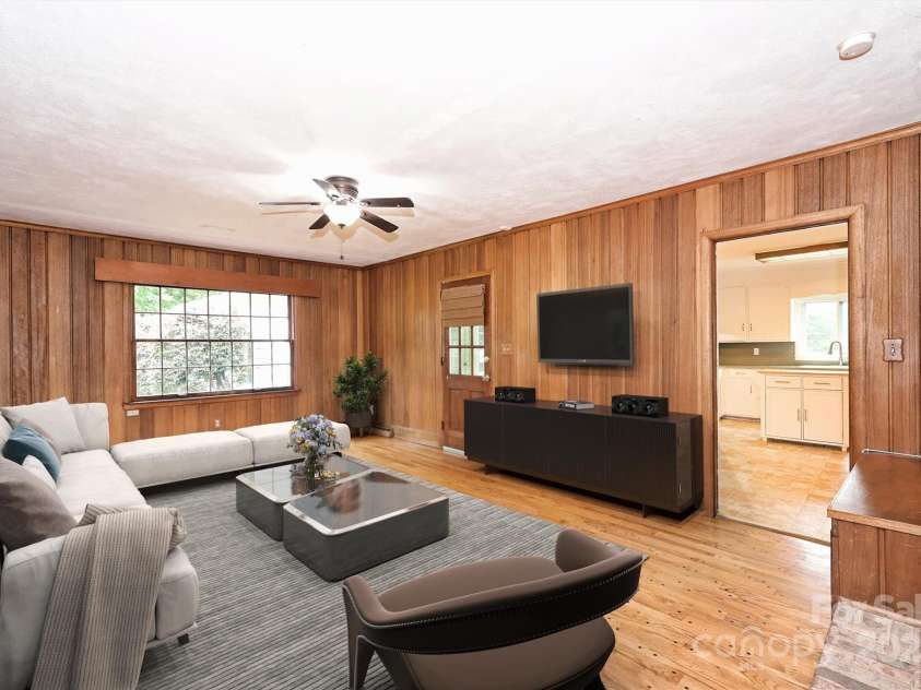 1961 Runnymede Lane, Charlotte, NC 28211.  MLS# CAR4265573, YatesRealty ID 23458. Virtually Staged Family Room