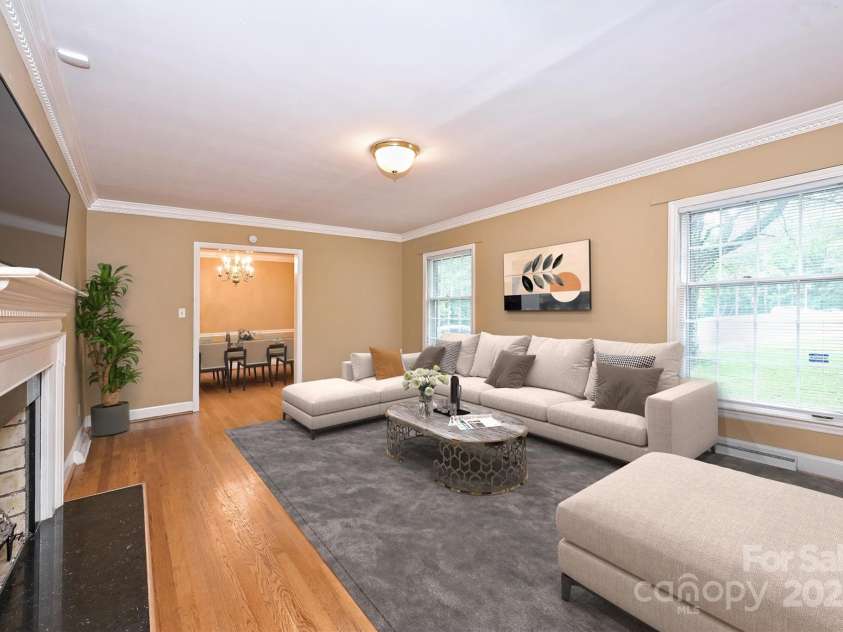 1961 Runnymede Lane, Charlotte, NC 28211.  MLS# CAR4265573, YatesRealty ID 23458. Virtually Staged Living Room