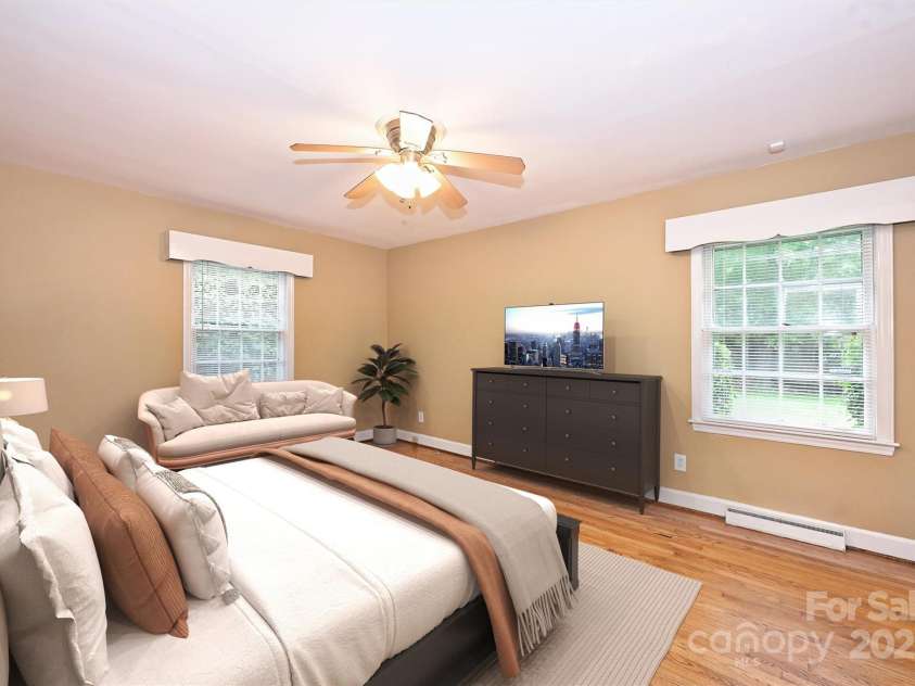 1961 Runnymede Lane, Charlotte, NC 28211.  MLS# CAR4265573, YatesRealty ID 23458. Virtually Staged Primary Bedroom