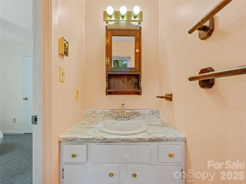 5 West Cove Street, Weaverville, NC 28787.  MLS# CAR4310907, YatesRealty ID 2346. Half bath