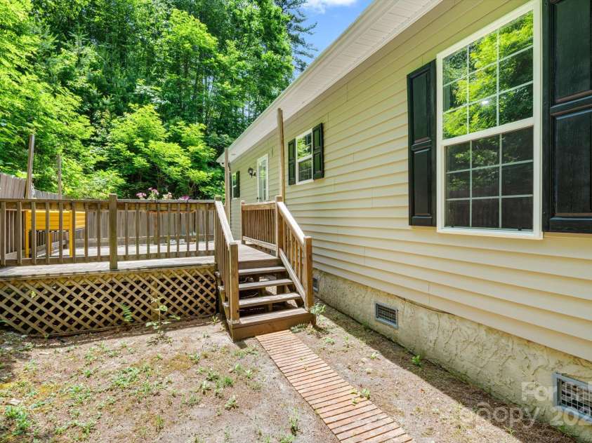 104 Jurassic Drive, Cashiers, NC 28717.  MLS# CAR4276823, YatesRealty ID 23460. 