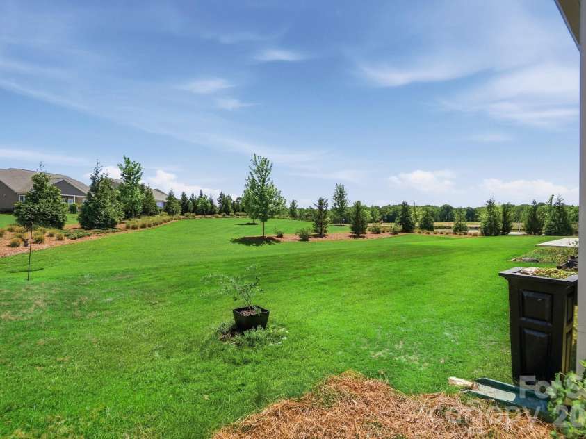 2015 Belle Mont Farm Avenue, Monroe, NC 28110.  MLS# CAR4369410, YatesRealty ID 23465. View from covered porch
