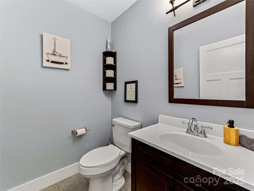 202 Mostert Drive, Asheville, NC 28804.  MLS# CAR4271515, YatesRealty ID 23465. Main level half bath