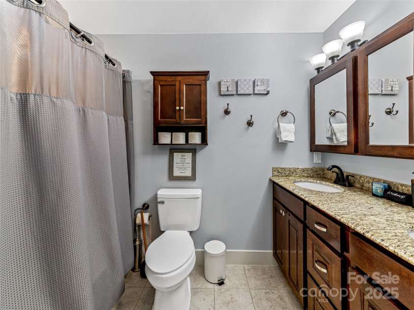 202 Mostert Drive, Asheville, NC 28804.  MLS# CAR4271515, YatesRealty ID 23465. Primary bath