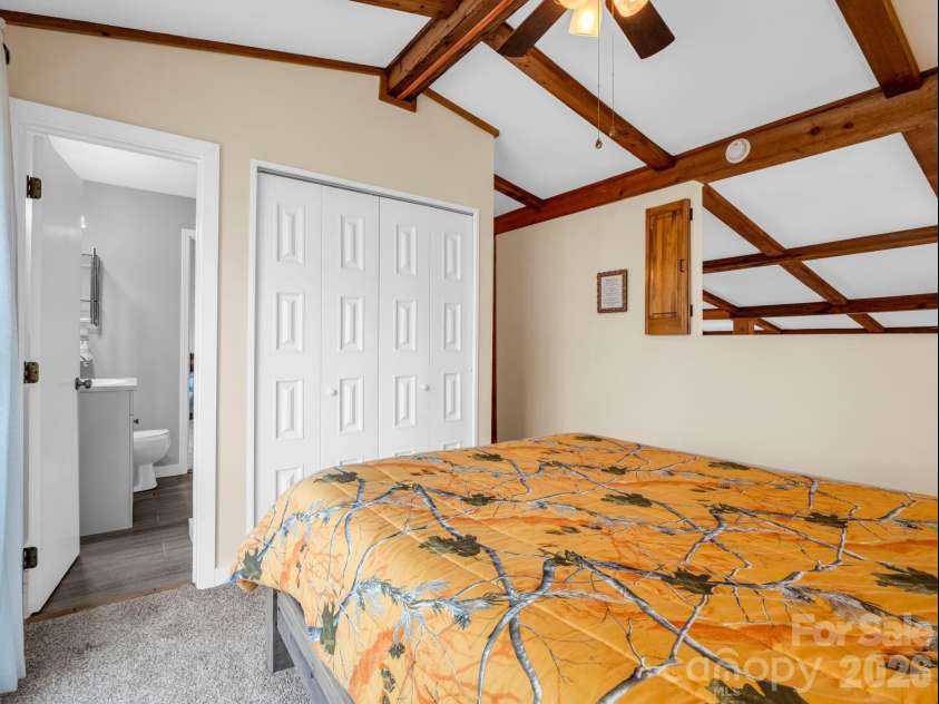 78 Wahuhu Court, Brevard, NC 28712.  MLS# CAR4369792, YatesRealty ID 23466. Upper Level Bedroom 