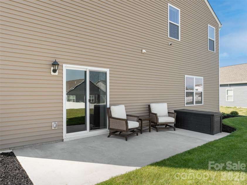 141 Wheatfield Road, Fletcher, NC 28732.  MLS# CAR4375463, YatesRealty ID 23468. Back patio