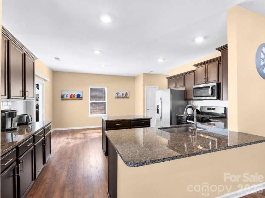 141 Wheatfield Road, Fletcher, NC 28732.  MLS# CAR4375463, YatesRealty ID 23468. Kichen w/ breakfast bar