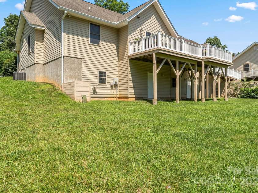 860 Asbury Road, Candler, NC 28715.  MLS# CAR4275726, YatesRealty ID 23471. Back of House