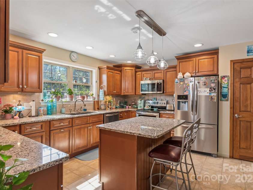 860 Asbury Road, Candler, NC 28715.  MLS# CAR4275726, YatesRealty ID 23471. Tons of counter space