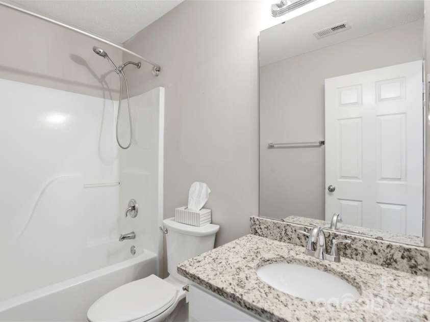 2881 Shadow Brook Court, Concord, NC 28027.  MLS# CAR4378881, YatesRealty ID 23476. Guest bathroom