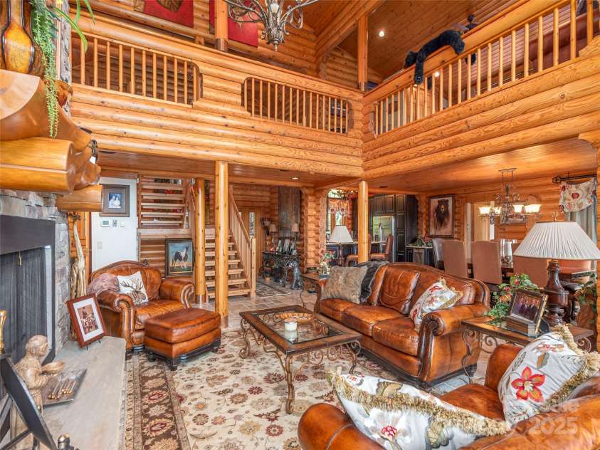 574 Leatherwood Drive, Maggie Valley, NC 28751.  MLS# CAR4275910, YatesRealty ID 23479. Hand-selected materials and custom finishes lend warmth and character