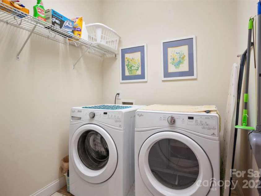 147 Bridge Lane, Tryon, NC 28782.  MLS# CAR4293368, YatesRealty ID 2348. Laundry room