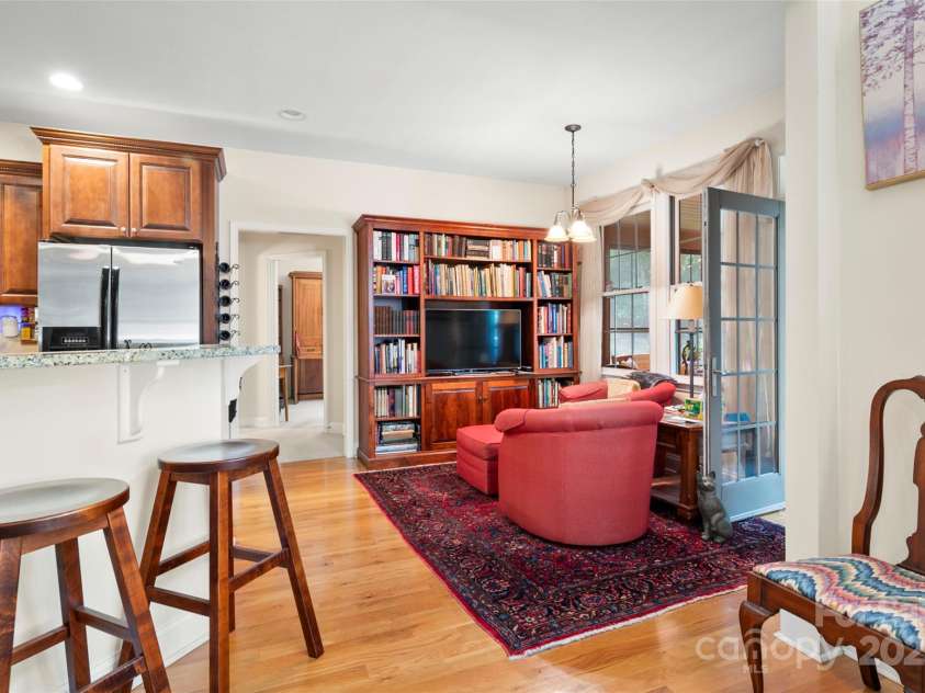 147 Bridge Lane, Tryon, NC 28782.  MLS# CAR4293368, YatesRealty ID 2348. Library area off kitchen