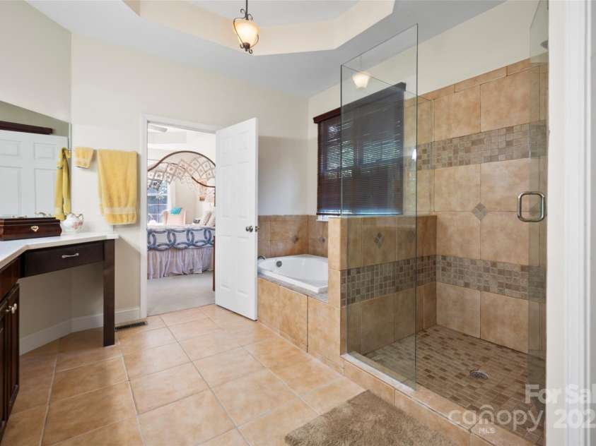 147 Bridge Lane, Tryon, NC 28782.  MLS# CAR4293368, YatesRealty ID 2348. Primary bath