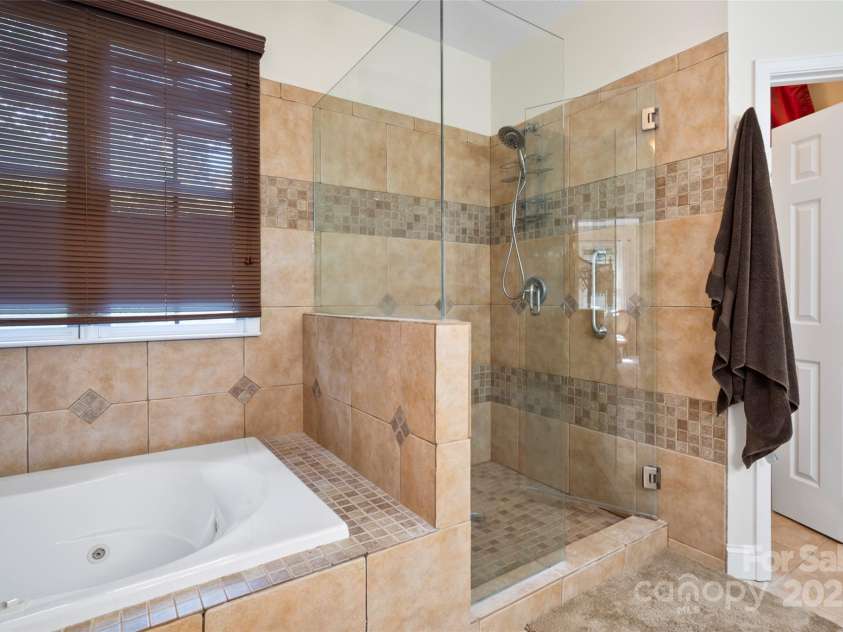 147 Bridge Lane, Tryon, NC 28782.  MLS# CAR4293368, YatesRealty ID 2348. Primary bath