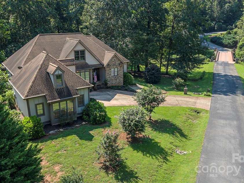 147 Bridge Lane, Tryon, NC 28782.  MLS# CAR4293368, YatesRealty ID 2348. Street view