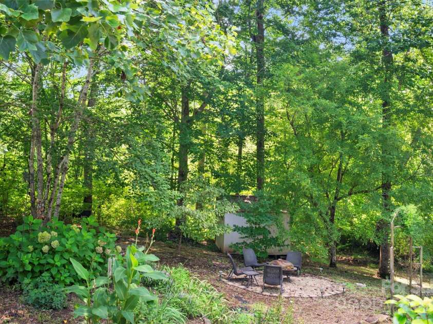 147 Bridge Lane, Tryon, NC 28782.  MLS# CAR4293368, YatesRealty ID 2348. Yard