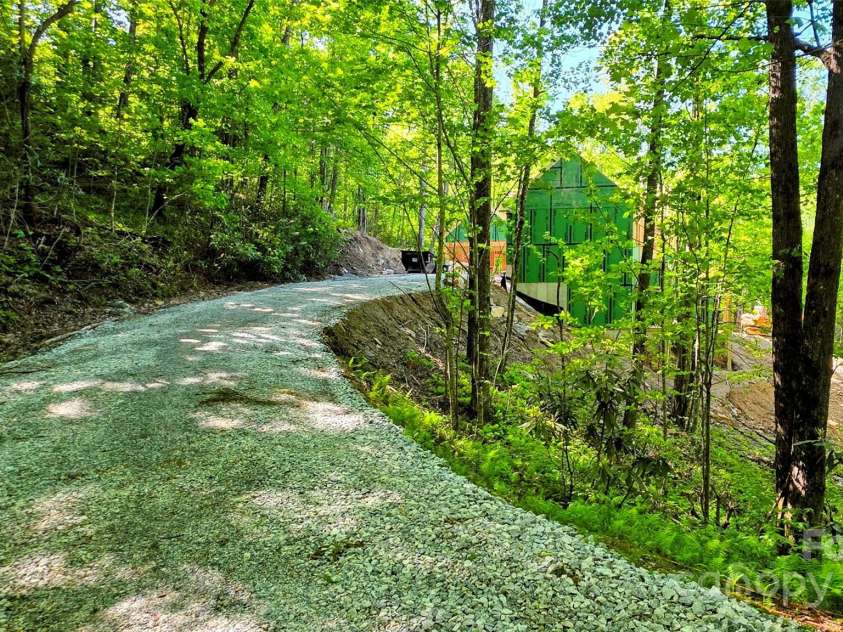 297 Easy Springs Road, Sapphire, NC 28774.  MLS# CAR4277320, YatesRealty ID 23481. 