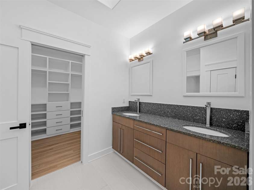 92 Cedar Street, Asheville, NC 28803.  MLS# CAR4377479, YatesRealty ID 23482. Double vanity in main bath with walk in closet