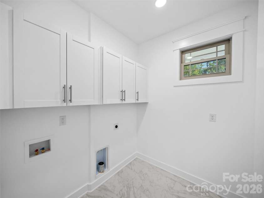 92 Cedar Street, Asheville, NC 28803.  MLS# CAR4377479, YatesRealty ID 23482. Laundry room #2 upper level.