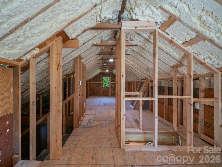 92 Cedar Street, Asheville, NC 28803.  MLS# CAR4377479, YatesRealty ID 23482. Unfinished attic space which could be connected to upper level staircase.