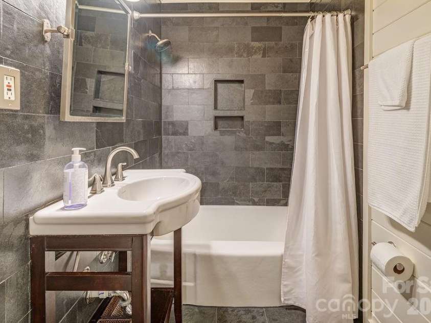 35 Dogwood Road, Asheville, NC 28804.  MLS# CAR4377400, YatesRealty ID 23486. Dramatic Slate Tile Walls & Shower