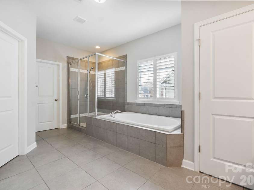 3022 Manchester Court, Indian Land, SC 29707.  MLS# CAR4358002, YatesRealty ID 23489. Primary Bath with separate tub and shower
